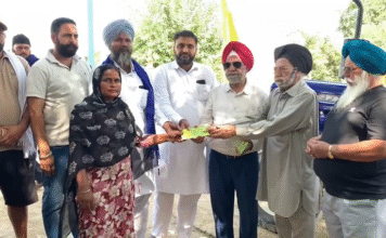 Gurdwara Shri Guru Singh Sabha Rajkot Management Committee handed over financial assistance to flood affected people for construction of houses.